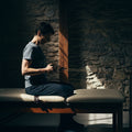Person on a rehab bench, focused on exercise, symbolizing active faith in God's promises from 2 Samuel with The text.