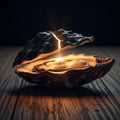 A glowing pearl emerging from a cracked oyster shell on a dark, rustic table.